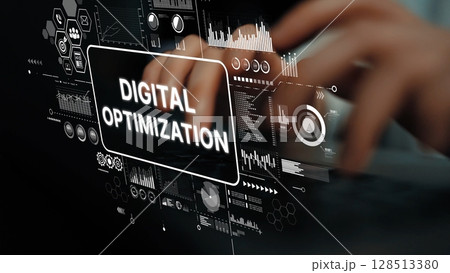 Hands on a keyboard with digital optimization graphics and data analytics visuals in a modern workspace environment. Asymptotic smart data analytic 128513380