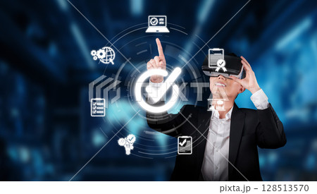 Business Professional Using Virtual Reality for Quality Control and Management Systems in Innovative Technology Environment XDMCP 128513570