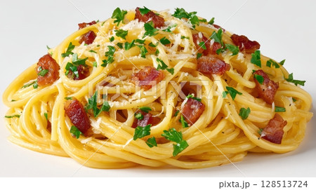 Creamy Spaghetti Carbonara Dish Made with Eggs, Cheese, Pancetta, and Pepper Garnished with Fresh Parsley 128513724