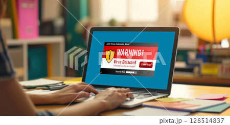 Virus warning alert on computer screen detected brisk cyber threat 128514837