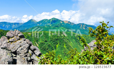 夏の妙高山登山(北峰頂上から焼山・火打山方面の眺め) 夏の妙高山登山(北峰頂上から焼山・火打山方面の眺め) 128515677