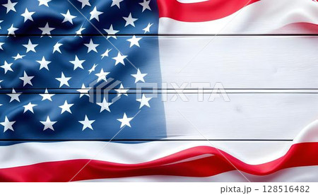 American flag on a white wooden backdrop, representing remembrance and respect for military sacrifices on memorial day 128516482