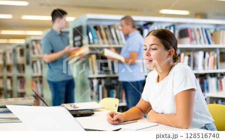 Smart female American student preparing for the exam 128516740