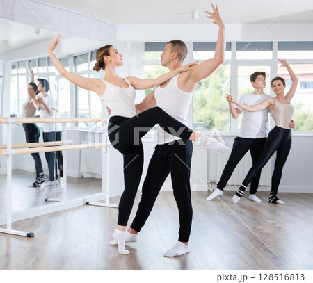 Young man and young woman rehearsing pair ballet 128516813