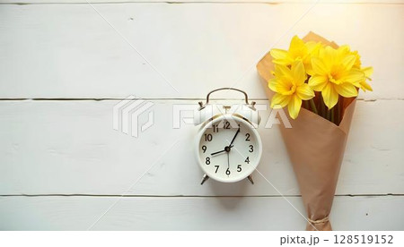 An alarm clock nestled among cheerful yellow daffodils, capturing the essence of springtime beauty 128519152