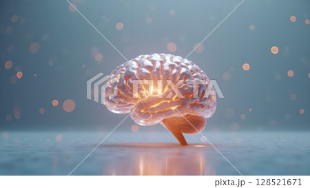 Illuminating intelligence: A mesmerizing 3D rendering of a human brain showcasing cognitive brilliance and neurological pathways enhanced with ethereal glowing particles surrounding it 128521671