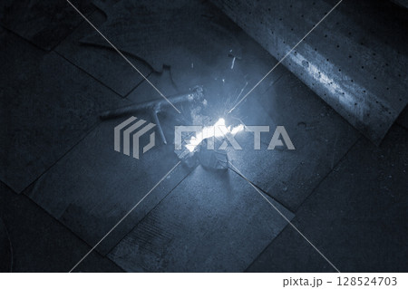 Laser cleaning of metal surfaces. Laser cleaning metal from rust. Glowing laser beam cleaning metal from rust. Laser removes removing old rust from metal. Innovation metalworking. New technologies Laser cleaning of metal surfaces. Laser cleaning metal from rust. Glowing laser beam cleaning metal from rust. Laser removes removing old rust from metal. Innovation metalworking. New technologies 128524703