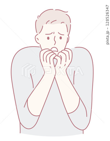 A very anxious young man is expressing his deep feelings of fear and worry quite clearly A very anxious young man is expressing his deep feelings of fear and worry quite clearly 128526347