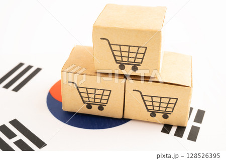 Box with shopping online cart logo and South Korea flag. Box with shopping online cart logo and South Korea flag. 128526395