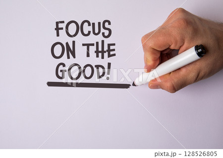 Focus on the good. Inspirational Message Written with Marker on White Background 128526805