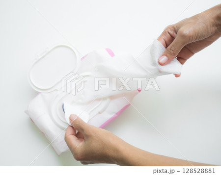 Tissue wet Paper Hygiene, Hand woman Open Above Packet White Antiseptic Napkins for Clean Bacteria Skin Baby and Cleaner Cosmetic Beauty Face Facial, Box Wipe Soft Handkerchie Medical Antibacterial. 128528881