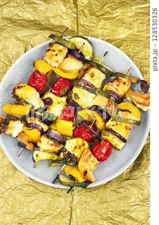 Grilled fish on skewers. 128530326