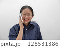 Portrait Asian Thai Girl Laughing While on Phone Call 128531386