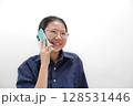 Portrait Asian Thai Girl Laughing While on Phone Call with copy space 128531446