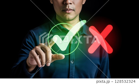 Person interacting with virtual checkmark and cross decision symbols. Person interacting with virtual checkmark and cross decision symbols. 128532324