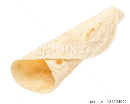 Single rolled flour tortilla isolated on white background, ideal for wraps, burritos, tacos, or snack preparation 128534062