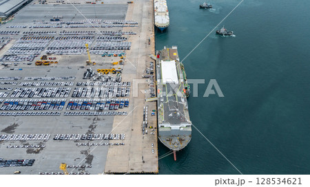 Aerial view vehicles carrier and new cars for import export transportation logistic, Vehicles carrier at industrial RoRo terminal port, Vehicles carrier global business logistic import export new car 128534621