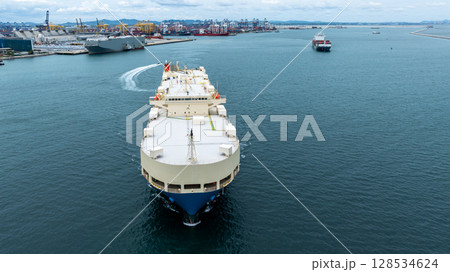 Aerial view vehicles carrier and new cars for import export transportation logistic, Vehicles carrier at industrial RoRo terminal port, Vehicles carrier global business logistic import export new car Aerial view vehicles carrier and new cars for import export transportation logistic, Vehicles carrier at industrial RoRo terminal port, Vehicles carrier global business logistic import export new car 128534624