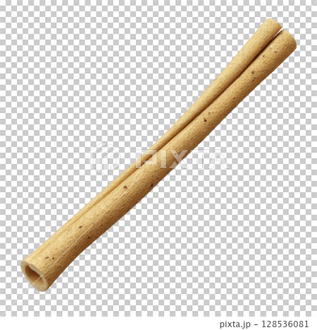 Single, long, cylindrical wafer roll with light brown color and small dark specks is shown against plain background. texture appears crispy and delicate 128536081