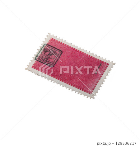 Vintage red postage stamp with black cancellation mark is displayed against transparency background, showcasing its perforated edges and classic design Vintage red postage stamp with black cancellation mark is displayed against transparency background, showcasing its perforated edges and classic design 128536217