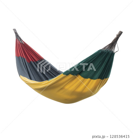 Colorful hammock with red, green, and yellow sections is suspended, showcasing vibrant and inviting design perfect for relaxation 128536415