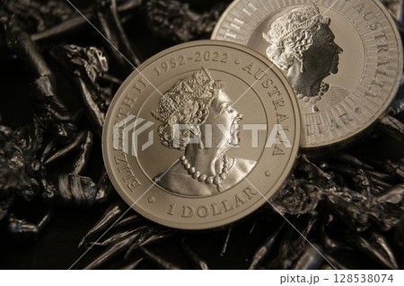 Investment coins on silver pieces.1 dollar close up. 128538074