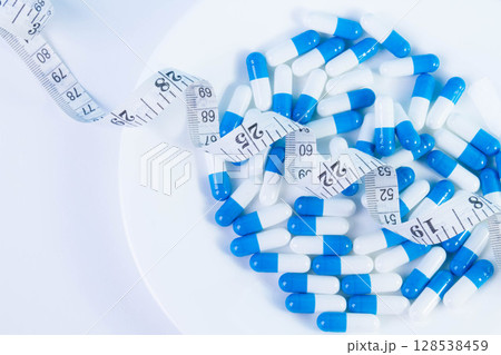 Weight loss pills. Obesity treatment. Overweight problems. Weight loss pills. Obesity treatment. Overweight problems. 128538459