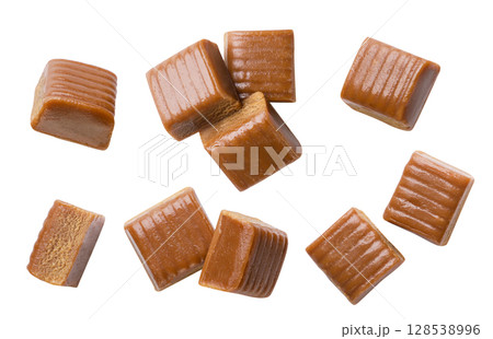 Set of toffee candies cut out on a white. Top view 128538996