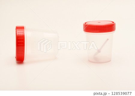 Jars for urine and fecal tests. Containers for medical tests. 128539077