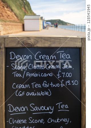 Devon cream tea on sale at traditional seaside cafe Devon cream tea on sale at traditional seaside cafe 128541945