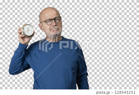 a man with an old alarm clock a man with an old alarm clock 128543251