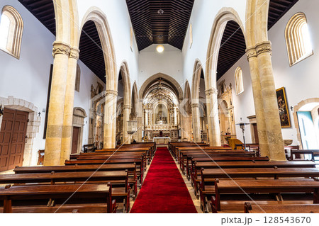 Tomar, Portugal - Mar 12, 2025: Interior of the Igreja de Sao Joao Baptista church in Tomar, Portugal Tomar, Portugal - Mar 12, 2025: Interior of the Igreja de Sao Joao Baptista church in Tomar, Portugal 128543670