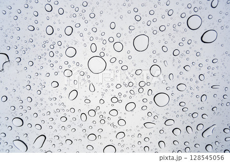 Raindrops on glass, Drops of rain on clear window. 128545056