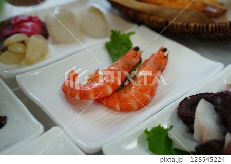 Close-up of Two Cooked Prawns on White Plate Close-up of Two Cooked Prawns on White Plate 128545224
