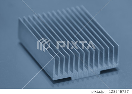 The aluminum heat sink parts in the blue tone. The aluminum heat sink parts in the blue tone. 128546727