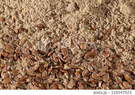 Flax Seeds and Ground Flaxseed Flour Macro View. 128547023