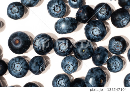 Summer berry background of fresh blueberries in water top view Summer berry background of fresh blueberries in water top view 128547104