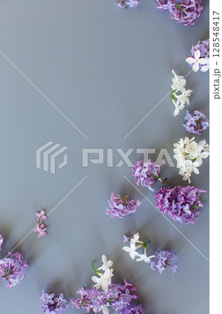 Romantic lilac bouquet on gray background 128548417