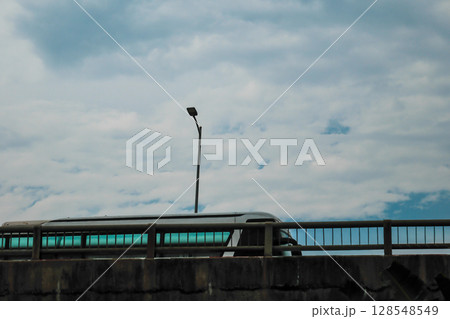 Quiet road stretching forward under overcast sky, Hanoi Vietnam 128548549