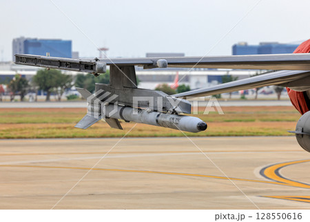 Dummy missile or Captive Air Training Missile (CATM) with inert warhead and rocket motor for training purposes. Missile for Captive Carry under wing of F16 fighter jet. 128550616