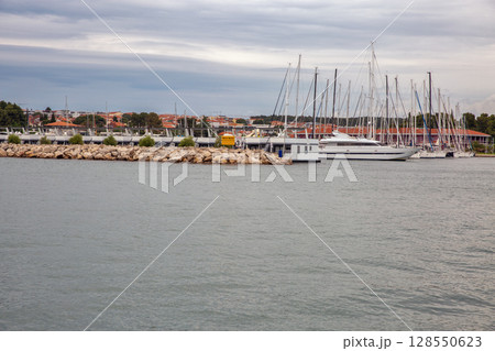 Marina with sailboats and yachts in Novigrad harbor, Croatia. Marina with sailboats and yachts in Novigrad harbor, Croatia. 128550623