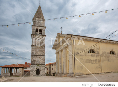 Church and Clock Tower in Visnjan Old Town, Croatia. Church and Clock Tower in Visnjan Old Town, Croatia. 128550633