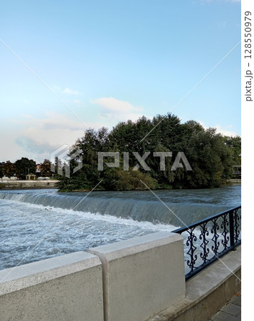 Scenic Terek River embankment in Vladikavkaz, North Ossetia - tree-lined promenade 128550979