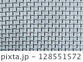Close-Up of Metallic Wire Mesh Grid in Horizontal and Vertical Lines 128551572