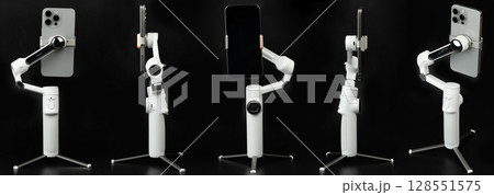 Smartphone in stabilizer gimbal Smartphone in stabilizer gimbal 128551575