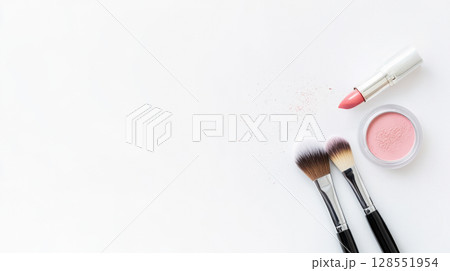 High-resolution top view of elegant makeup brushes and powder, with copy space for cosmetic shop promotions or professional makeup artist portfolio. 128551954