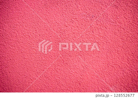 Pink cement wall texture. Abstract background for design with copy space. Pink cement wall texture. Abstract background for design with copy space. 128552677