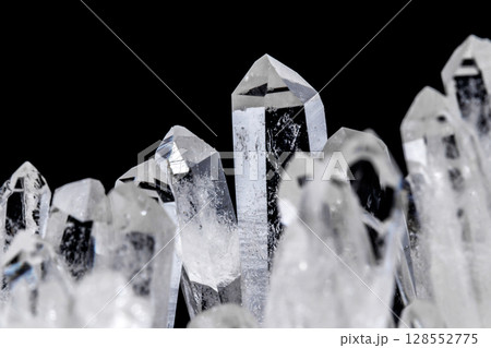 Macro Mineral Stone Rhinestone in Crystals on a Black Background Macro Mineral Stone Rhinestone in Crystals on a Black Background 128552775
