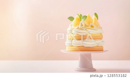 Elegant layered cake with whipped cream and fresh starfruit on a ceramic stand, ideal for upscale bakery branding and editorial visuals. 128553182