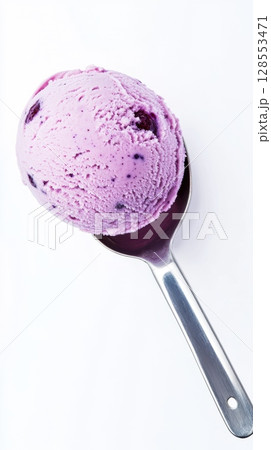 Refreshing blueberry scoop in clean minimal styling, glossy texture and vibrant color, ideal for food ads, digital packaging, and banners. 128553471